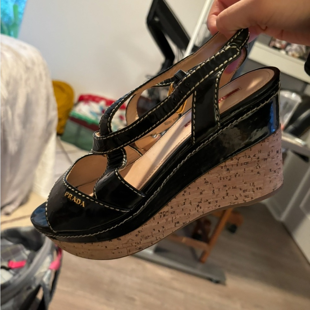 Prada Black Patent Leather Cork Wedge Sandals
Size 39.5 is women’s 8-8.5